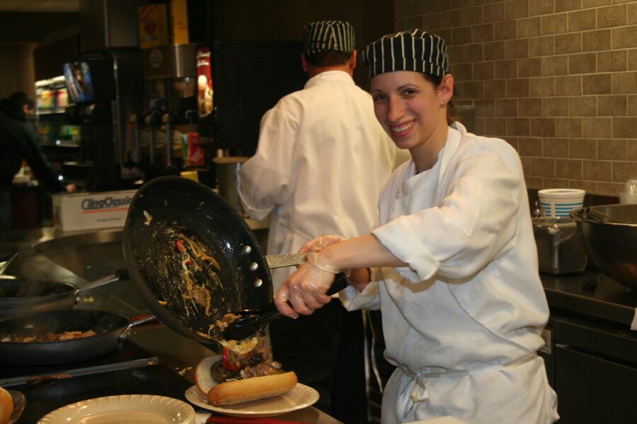 2 Chefs cooking in a kitchen