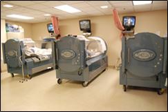 Three hyperbaric machines in a room